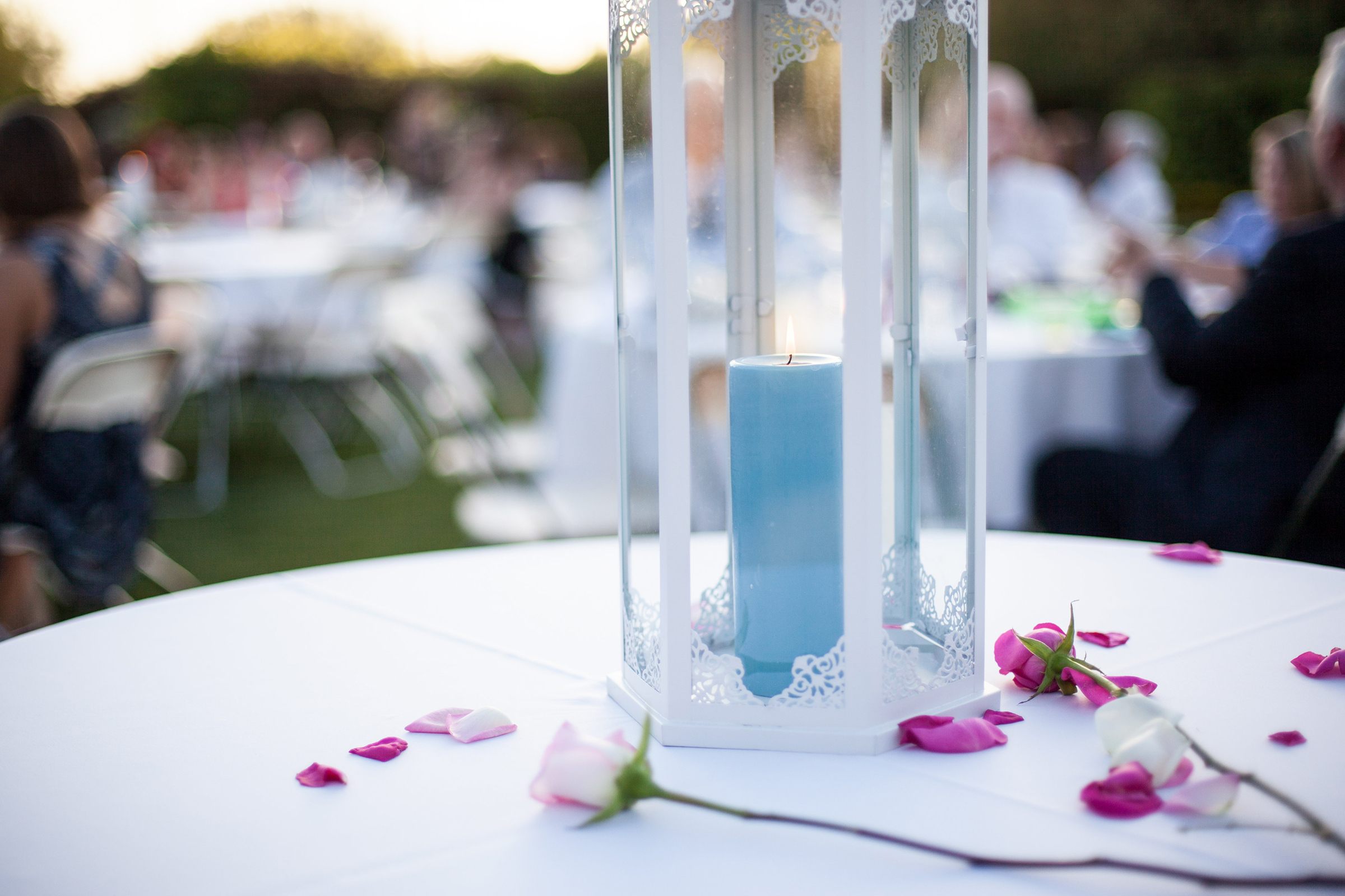 white candle lantern wedding table centerpiece
