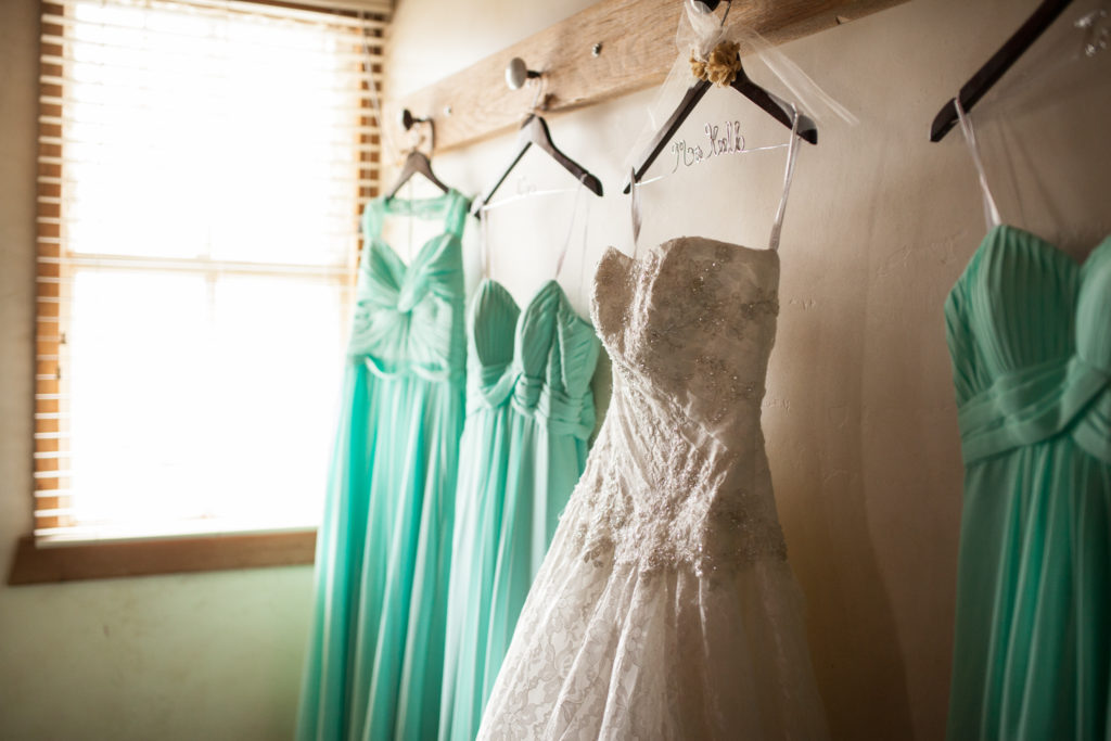 wedding dress and tiffany blue bridesmaid dresses on wire name wedding hangers