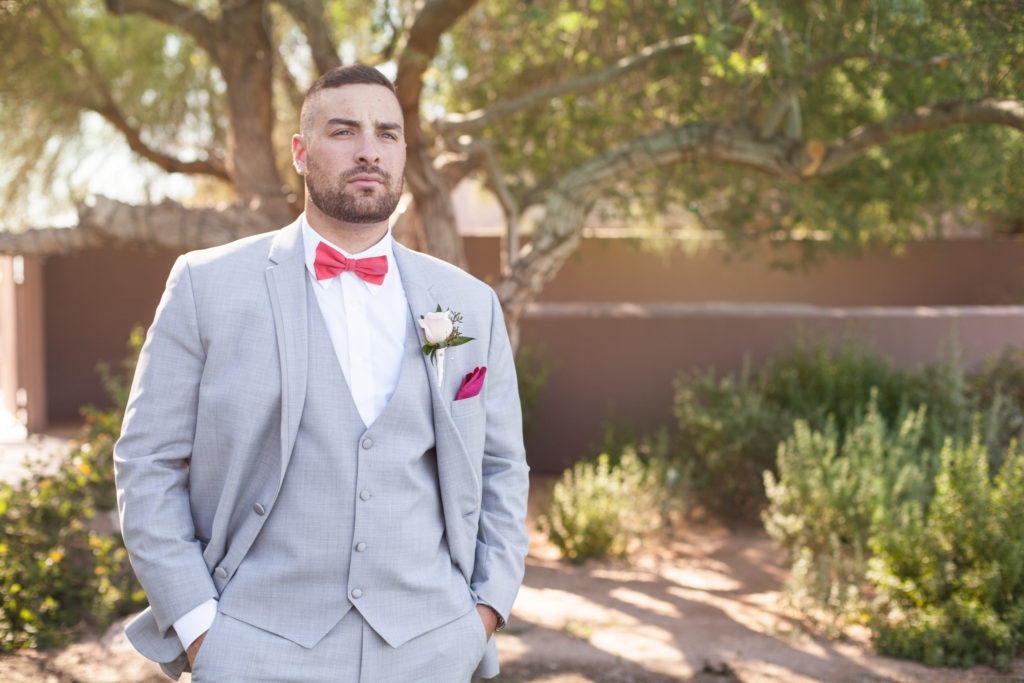 groom's tux, grey suit with red bowtie