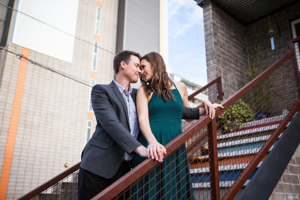 downtown phoenix engagement photos engagement pictures engagement photographer colorful stairs long flowy green dress from lulus for engagement session