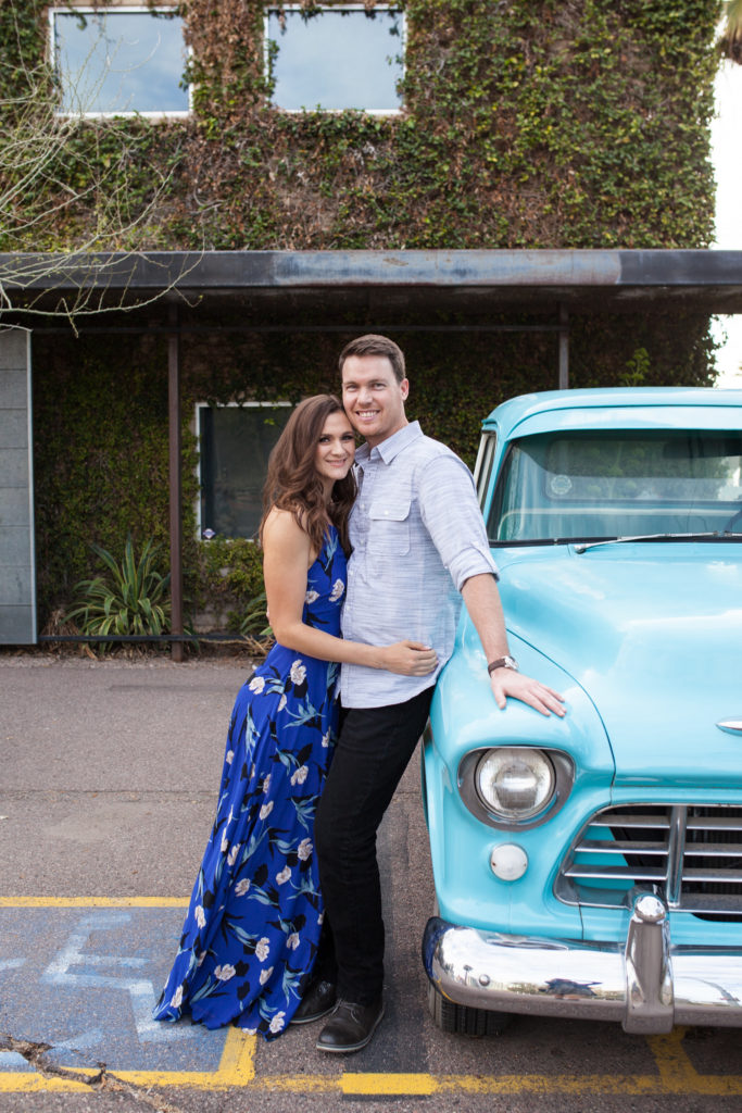 downtown phoenix engagement photos engagement pictures engagement photographer vintage blue truck old ford truck tiffany blue engagement picture with old car long flowy blue dress from lulus