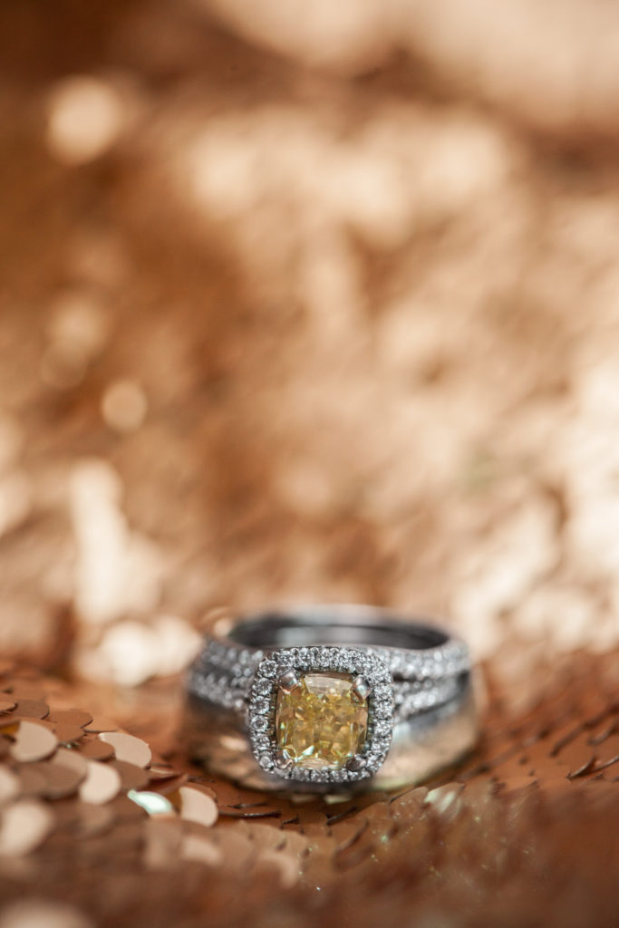 yellow diamond engagement ring with halo