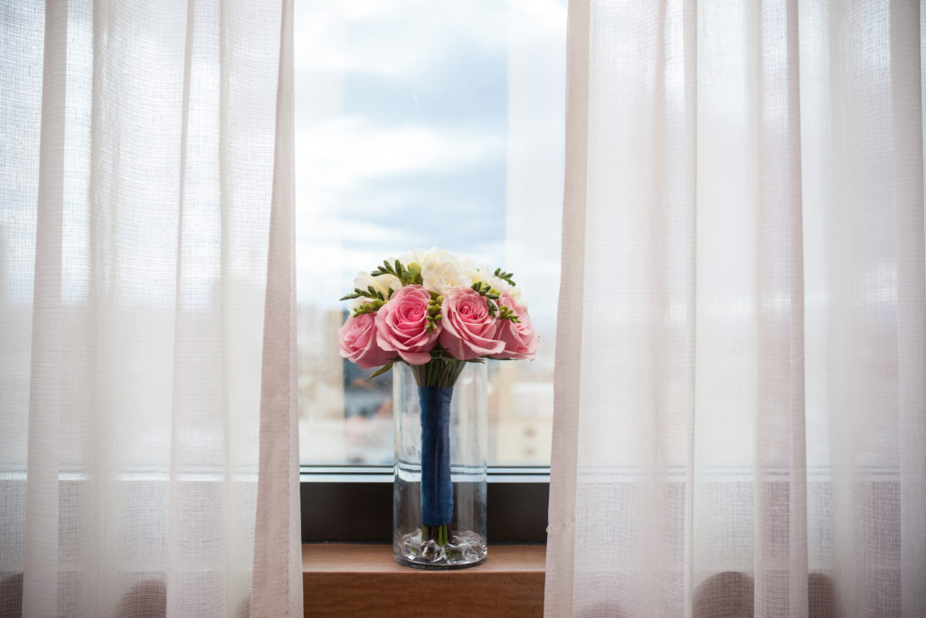 bridal bouquet on window sill