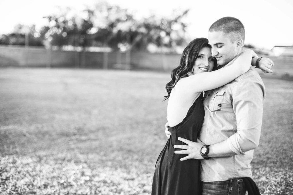 childhood sweethearts proposal story and playground engagement photos