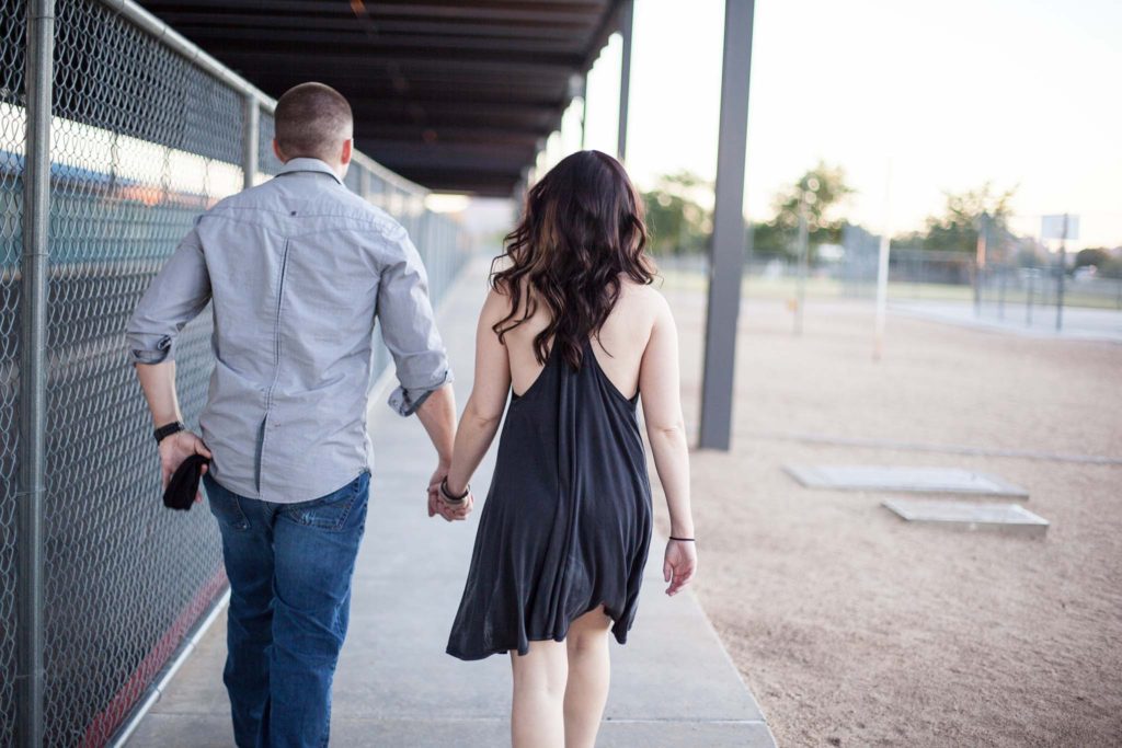 childhood sweethearts proposal story and playground engagement photos