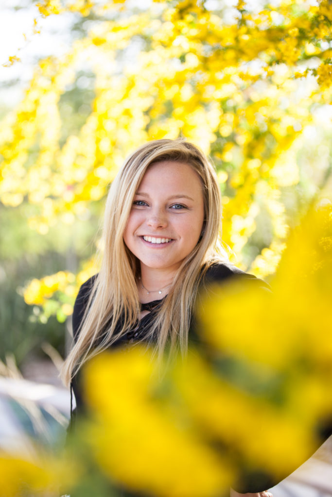 desert senior portraits with palo verde trees with yellow flowers