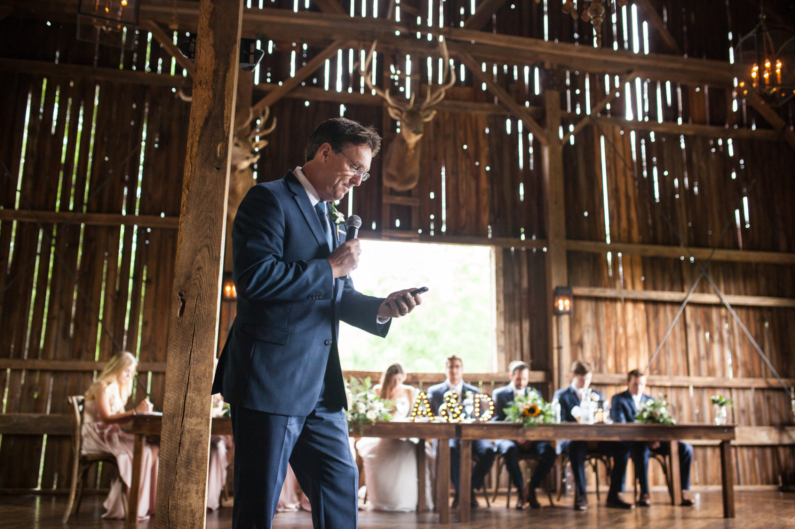 speeches during wedding reception in the barn of The Farm at Dover