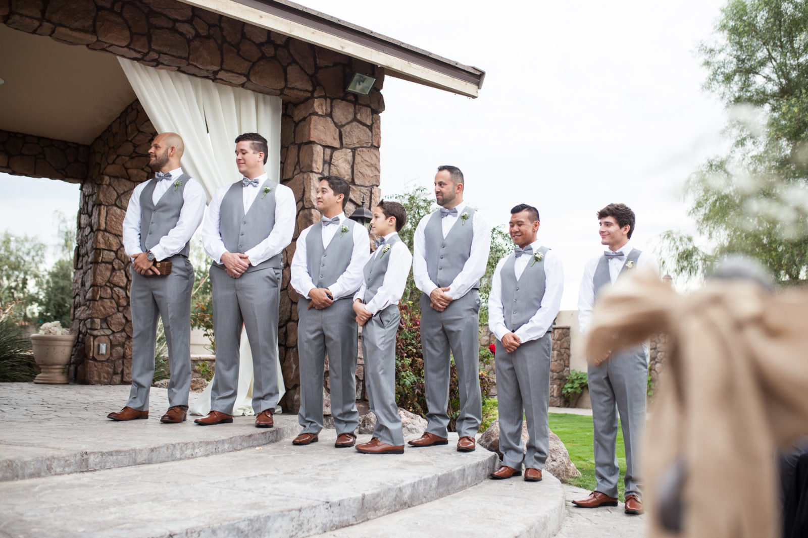 groomsmen during wedding ceremony