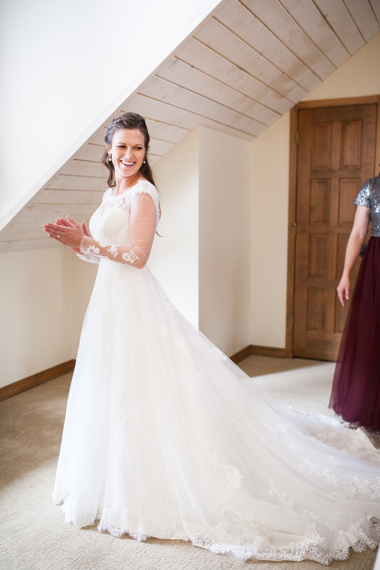 getting ready pictures with long sleeve wedding dress