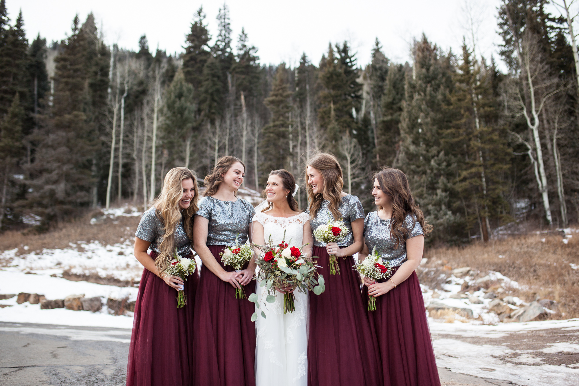 maroon and sequins bridesmaids dresses for winter wedding ideas, durango colorado winter wedding inspiration, laughing bridesmaids