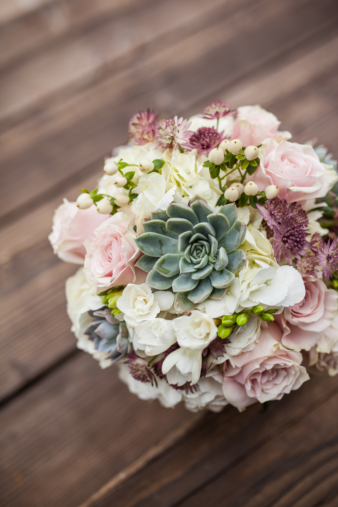 succulent wedding bouquet with pink roses