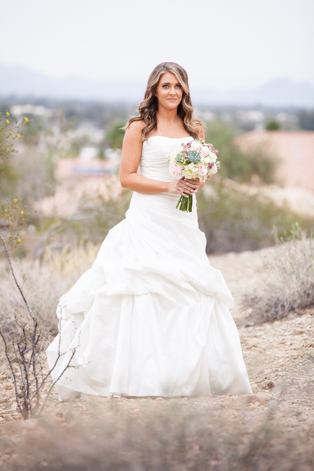 bride in semi sweetheart strapless ruffled wedding dress