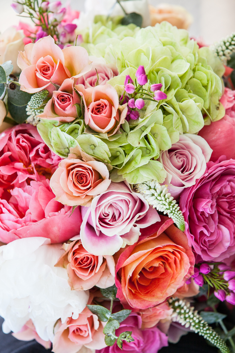 bride bouquet with pink and orange roses