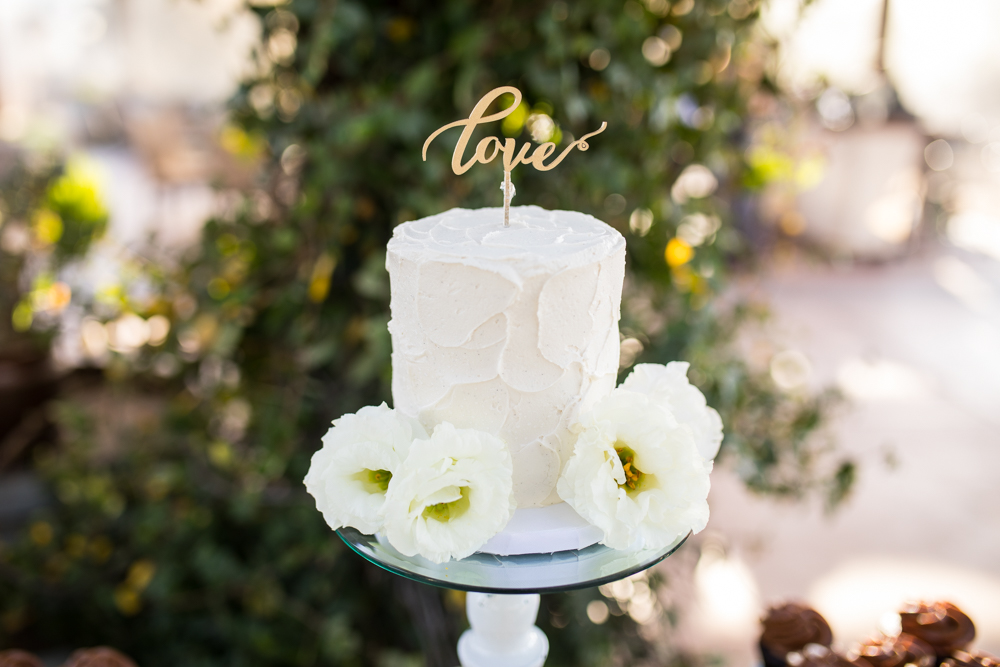 Temecula Winery Wedding cake table and wedding cake with love cake topper