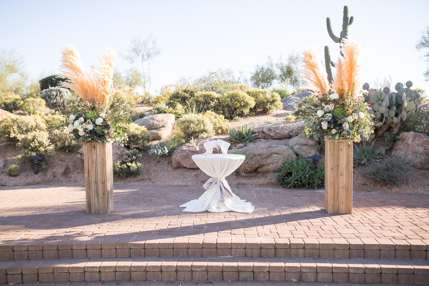 troon north chasing bliss designs wedding ceremony floral arrangement