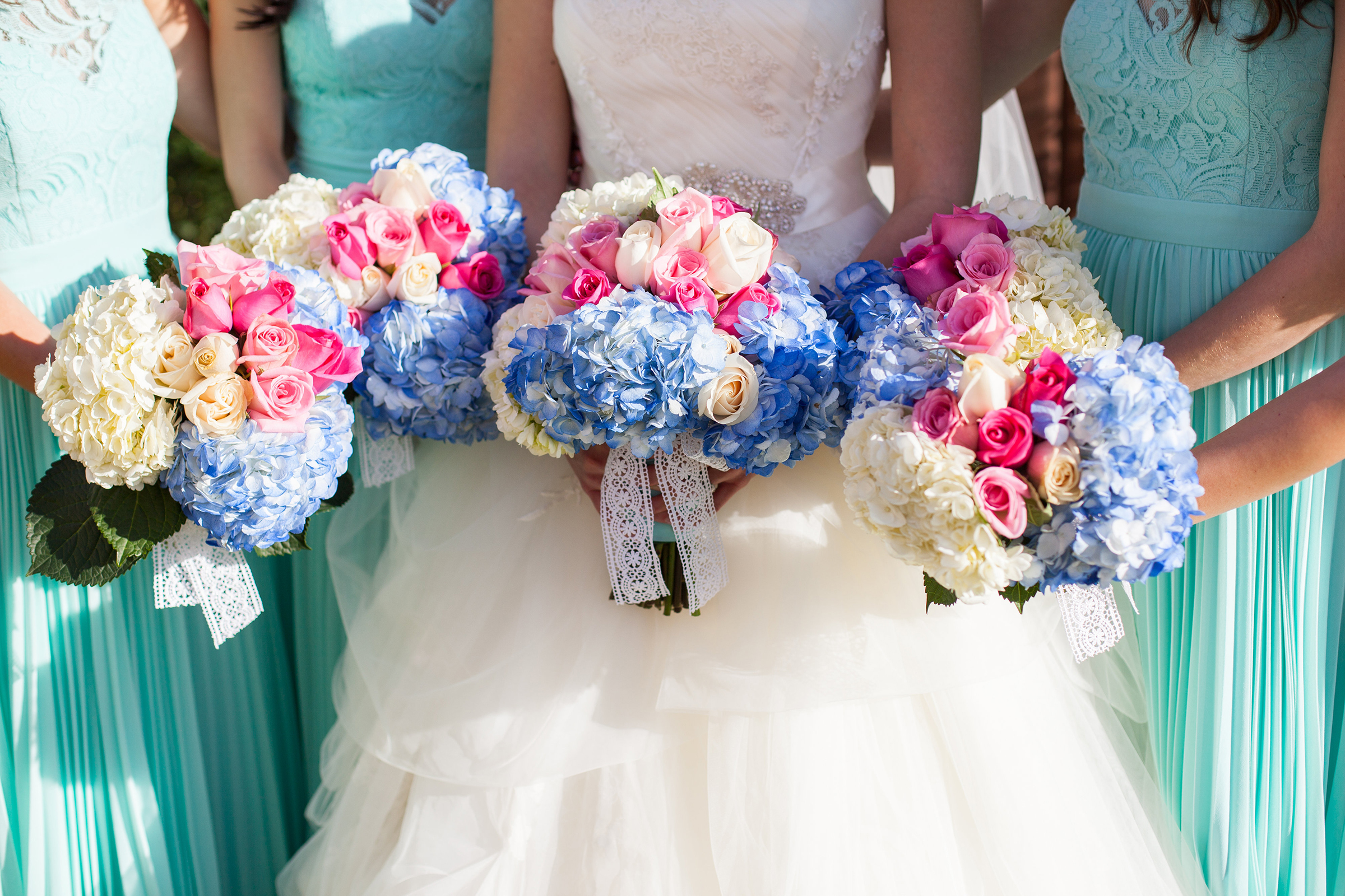 blue pink and cream bride and bridesmaids wedding bouquets