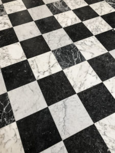 checkered floors inside the Palace of Versailles Paris France