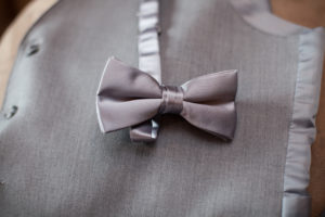 grooms grey bowtie and vest waistcoat