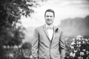 groom wearing grey suits and vests