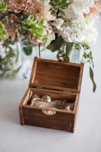 wooden box with wedding rings