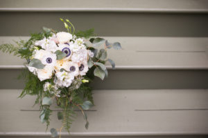 bridal bouquet with black and white anemone and eucalyptus by Gia Bella Flowers