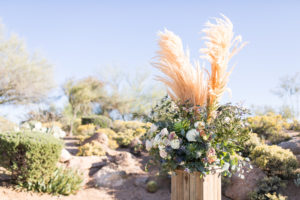 chasing bliss designs wedding ceremony floral arrangement